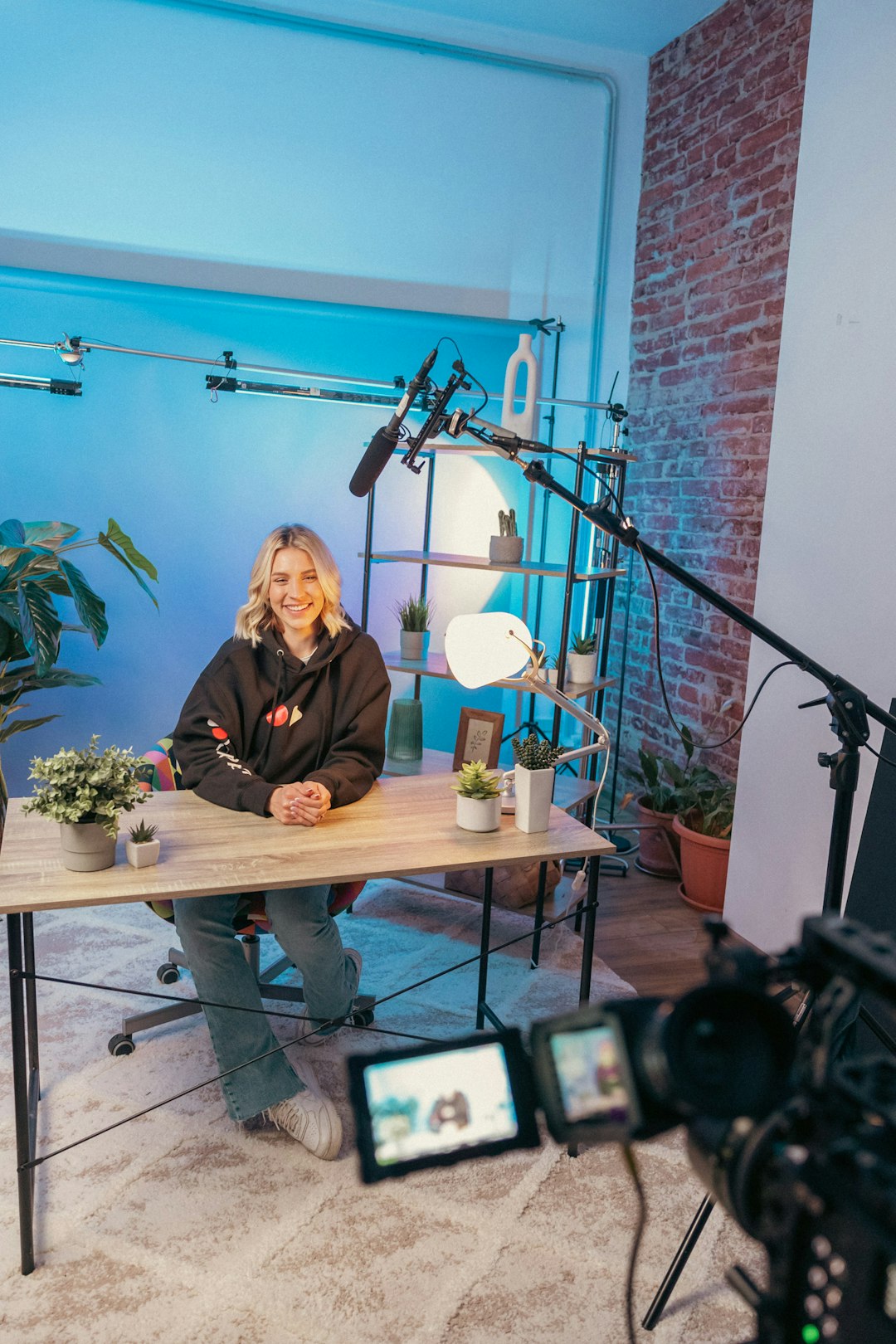 One of the photos from our last shoot at videodeck. We produce video explainer videos for Software companies and we want to show you a sneak peek of our production studio. Here you can see the camera we use to shoot, one of our spokesperson and our video set.